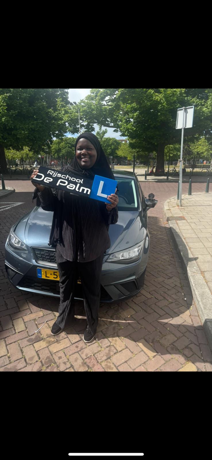 Geslaagde leerling met De Palm
